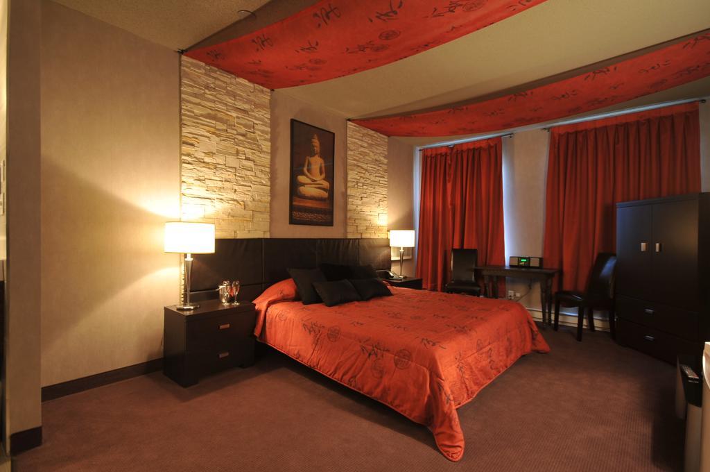Motel Capri Et Suites เรอปองติญี ภายนอก รูปภาพ
